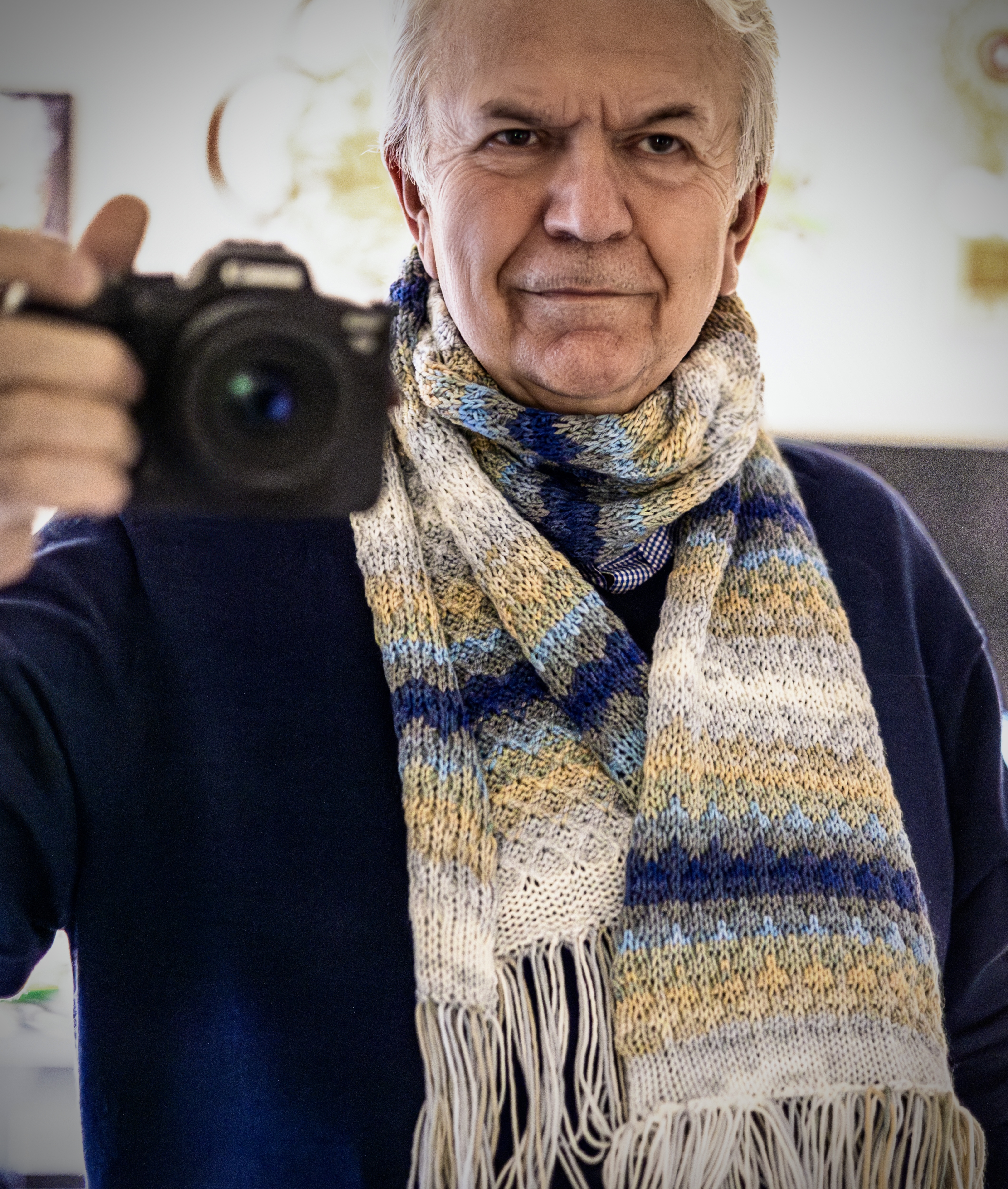 Vassily wearing one of his knitted scarves